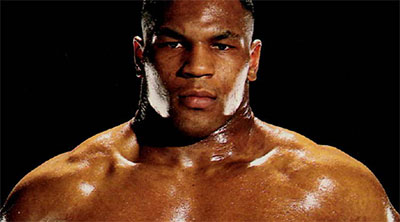 Mike Tyson shows us his extremely wide neck from exercising to prevent being knocked out.