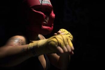 A boxer throws a right hand during training.