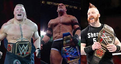 Three of the top WWE champions including Brock Lesnar wearing their championship belts.