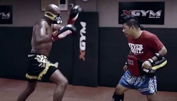 Anderson Silva training his martial art in the gym.